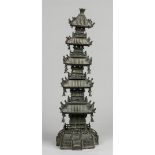 A black patinated bronze model of a Chinese pagoda. some bu