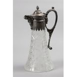 A cut and etched glass wine decanter with a silver Neo-Rena