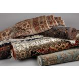 A lot consisting of (5) "Persian" carpets, including at lea
