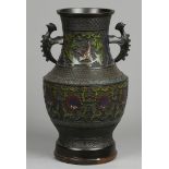 A cloisonnŽ vase decorated with birds and plants. Japan, la