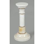 A white marble column consisting of separate parts, finishe