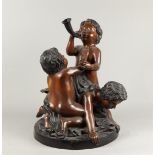 A bronze group of putti making music, second half of the 20