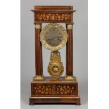 A mahogany column mantel clock with intarsia inlay of fruit