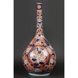 A porcelain Imari large belly vase with flower beds decor.