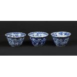 A set of porcelain bowls with floral decor in the center st