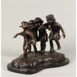 A bronze group of royal children playing blind man. Second