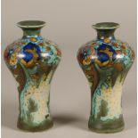 A set of earthenware baluster vases with corona decor. Goud