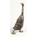 An impressionistic bronze of a waddling duck. unclearly sig