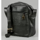 A black leather Loewe cross body men's bag. 33 x 30 x 10 cm