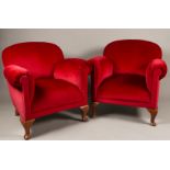 One of (2) red robes upholstered club armchairs on Queen An