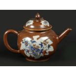 A porcelain Famille Rose teapot with a capuchin exterior. C