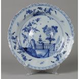 An earthenware dish with floral decor. Marked the Porcelyne