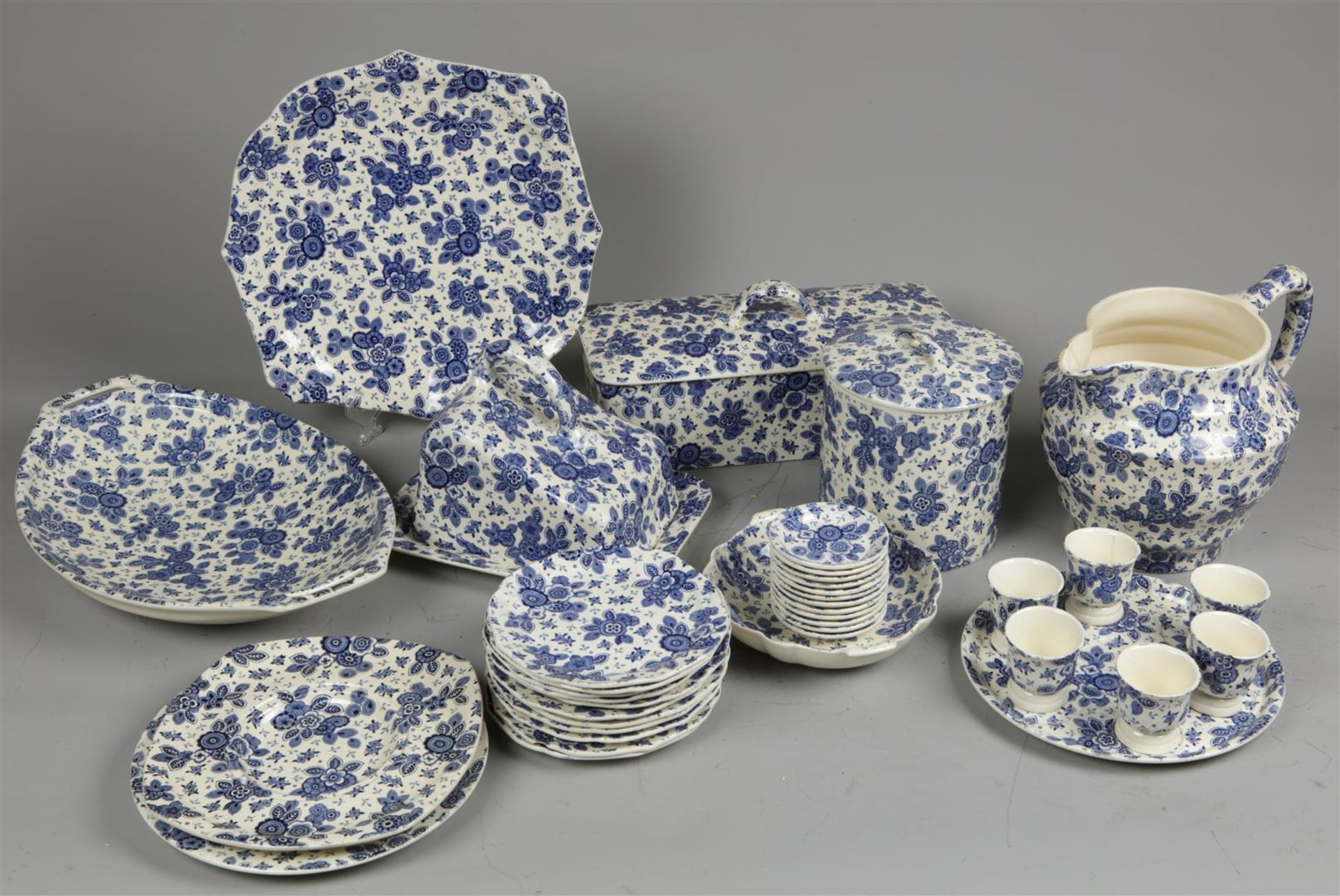 A large earthenware set with Beatrix decor. society ceramic