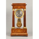 A mahogany column mantel clock with intarsia inlay of fruit