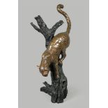 A bronze group depicting a leopard in a tree. 2nd half of t