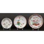 A lot of porcelain Famille Rose plates, with bird and butte