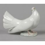 A porcelain sculpture of a pigeon, marked Ladro. Spain, lat