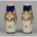 A set of polychrome painted earthenware vases, marked Rozen
