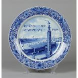 A Delft earthenware plate with inscription: 'IX Olympiade A