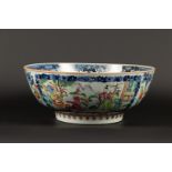 A porcelain famile rose bowl decorated with various Chinese