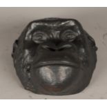 A bronze monkey head. 2nd half of the 20th century. H.: 29