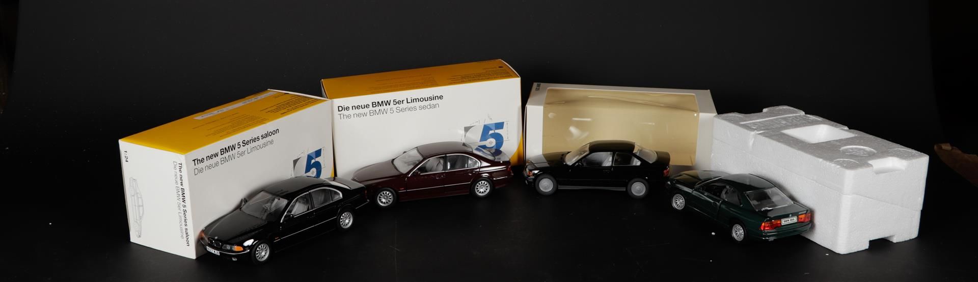 A lot of 4 model cars consisting of a BMW 850i, 5er limosin