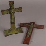 A lot of (2) Art Nouveau crucifixes. Green patinated bronze