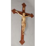 A large wooden crucifix. First half 20th century. H.: 135 c