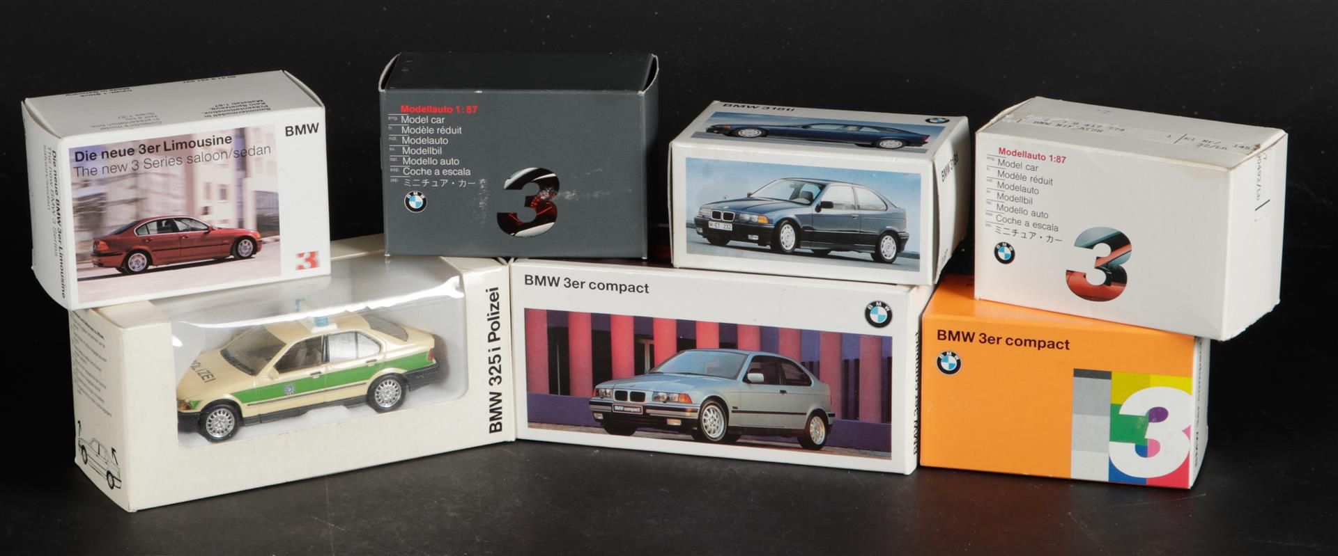 A lot of 7 model cars consisting of a BMW 325i police, stat