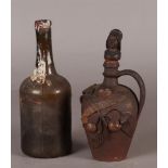 French vintage Calvados Stoneware bottle with apple decor, ceramic jug with man's head. Cut stopper.