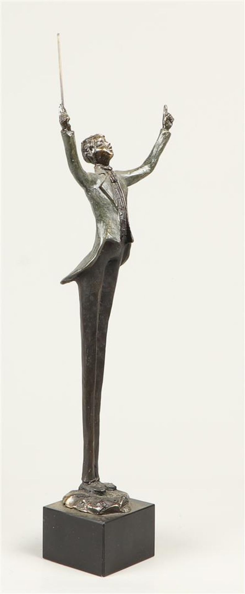A 20th century bronze statuette of a conductor. - Image 2 of 4