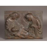 A bronze plaque depicting the entombment of Christ. First quarter of the 20th century.
