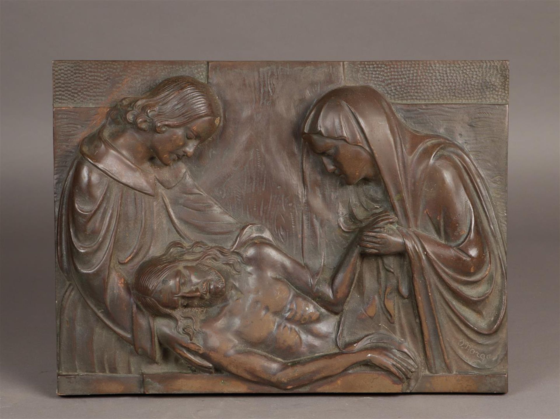 A bronze plaque  depicting the entombment of Christ. First quarter of the 20th century.