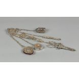 A silver sewing set on a chatelaine, Marks J.S. & S, Anchor, Lion 850/1000 and year letter "W" for