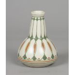 An earthenware vase with a line decoration all around, design Bert Nienhuis 1903-'10, executed by De