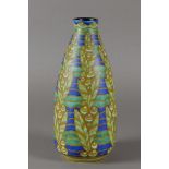 Charles Catteau for Boch Freres Keramis. An earthenware art decor vase with floral decor.
