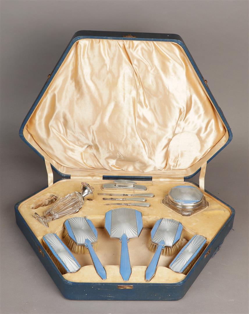 An Art Deco dressing table set in silver and enamel. In original leather box. Henry Clifford Davis B