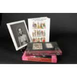 Collection of books including The Mingins Photo Collection: 1288 Pictures of Early Western Tattooing