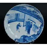 A porcelain lobed plate with decoration of two figures with servant in pavilion. Marked Chenghua on