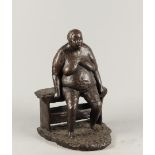 A dark patinated bronze statue of a voluptuous lady on a bench. 2nd half of the 20th century.