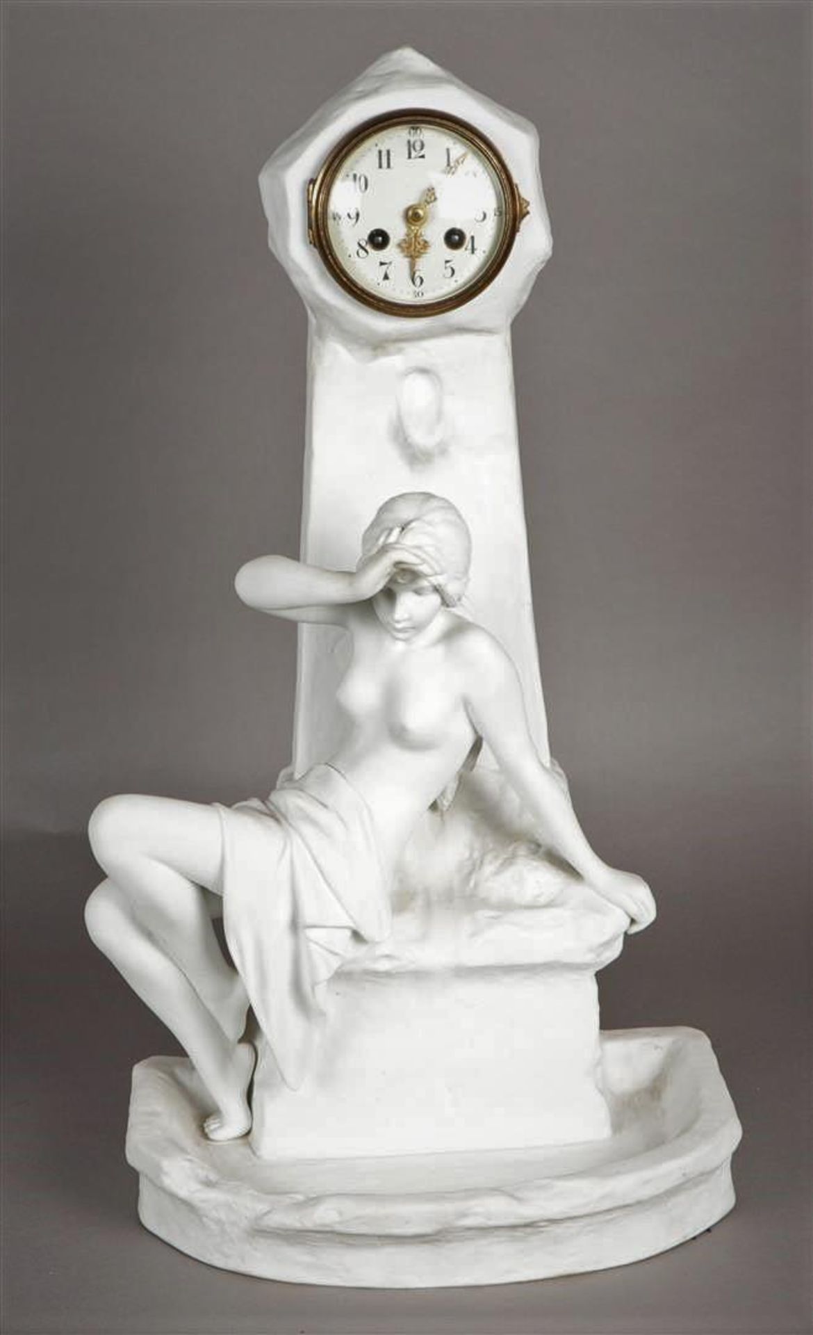 A biscuit Art Nouveau mantel clock, ca. 1900. (Not tested for long-term operation).