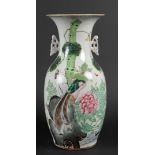 A Qianjiang Cai porcelain vase with Chinese figures in a landscape, China, 19th/20th C.