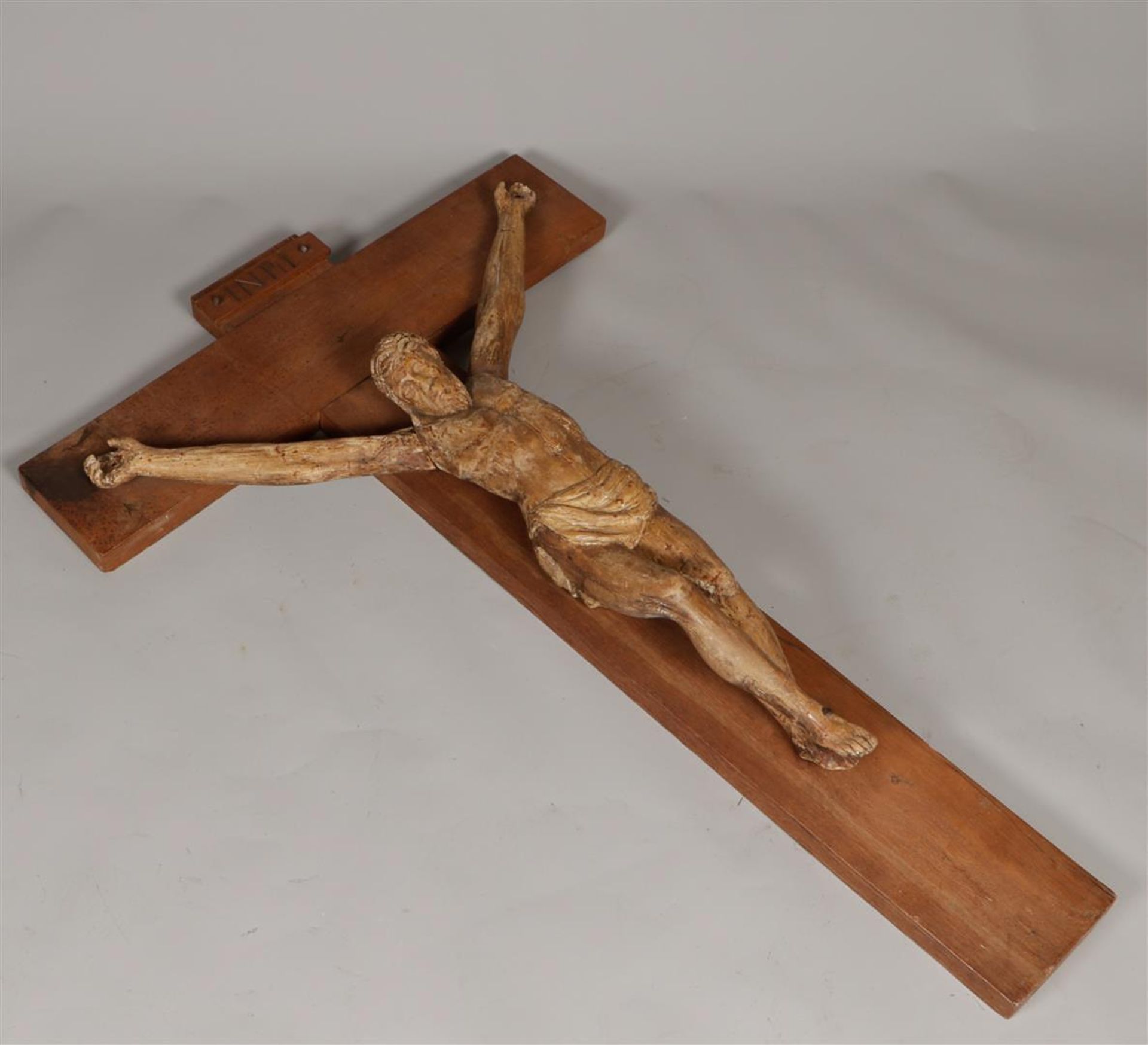 A large wooden Corpus ca. 1800, mounted on a later crucifix.