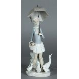 A porcelain figure in the shape of a lady with umbrella and geese, marked Lladro. Spain, 20th centur