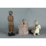 A lot consisting of (2) terracotta groups. A woman with a hare, and a bird rider. Possibly India and