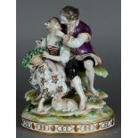 A porcelain group of an elegant couple with a sheep in the foreground, on an oval base. Vollstedt ca