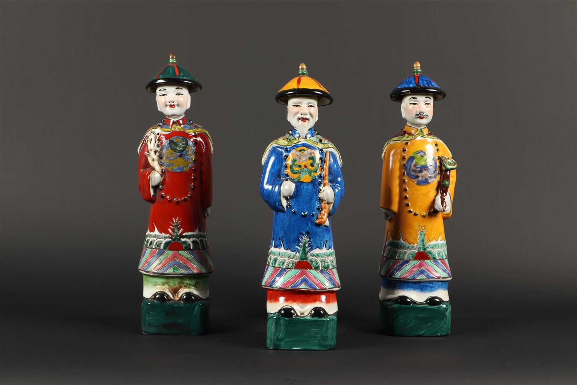 A set of porcelain court officials. China, late 20th century.