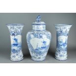 A blue and white garniture, ca. 1930. One vase has a chip.