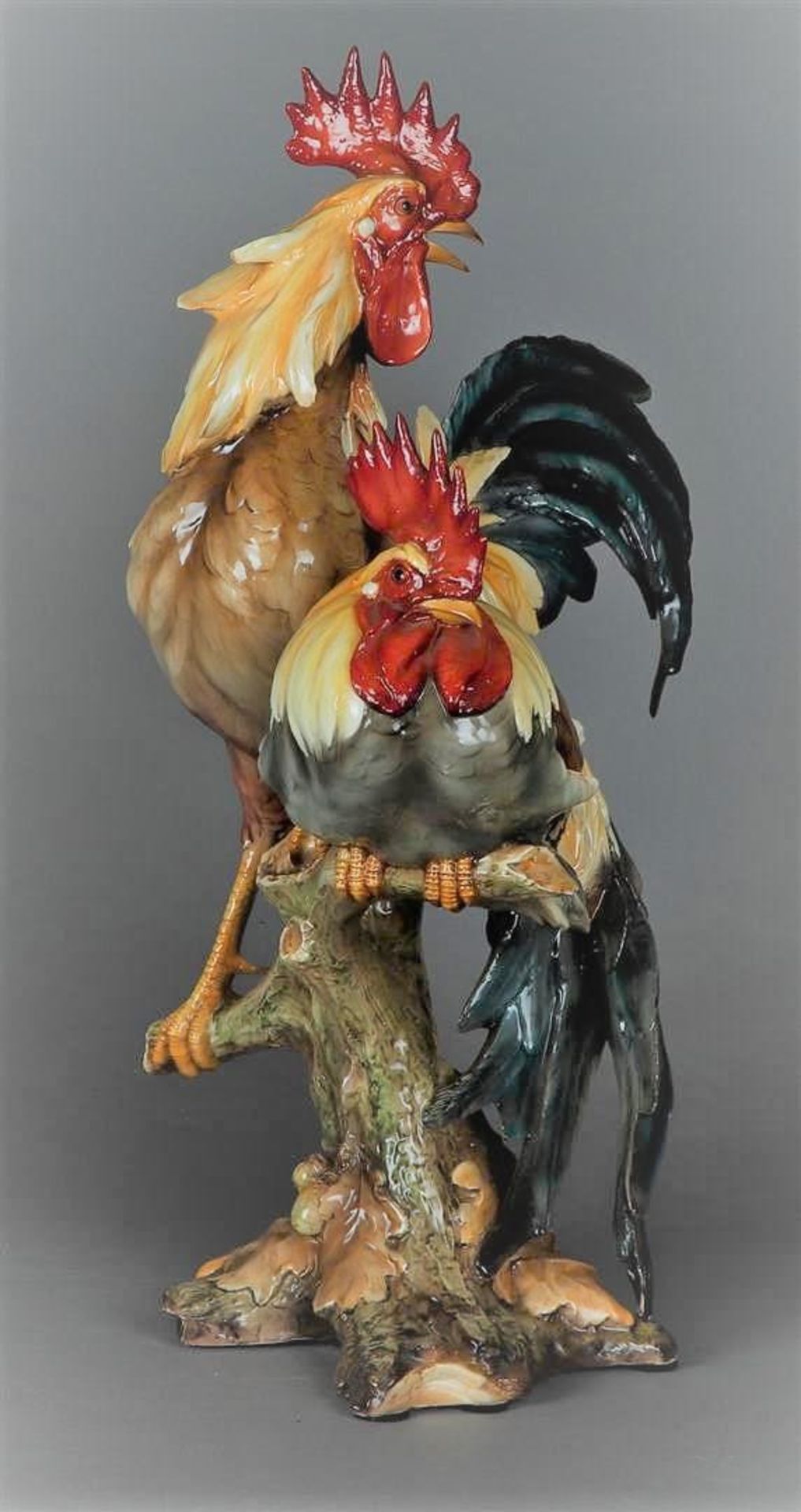 A capital, polychrome group of roosters, Italy, 20th century.