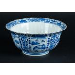 A porcelain hooded bowl with landscape and floral decor in compartments, marked Kangxi. China, 19th